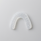 Top-down view of upper and lower tooth covers